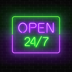 Neon open 24 hours 7 days a week sign in rectangle shape on a brick wall background.