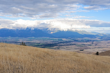 Mountains behind farmland in Montana