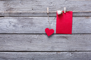 Valentine day , paper heart and card on wood background