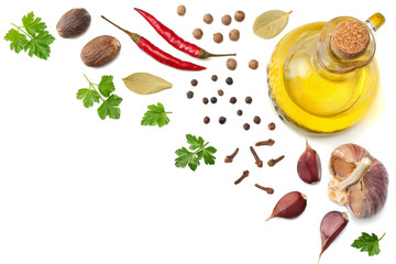 garlic, red chili or chilli cayenne pepper, oil, parsley and spices isolated on white background. top view