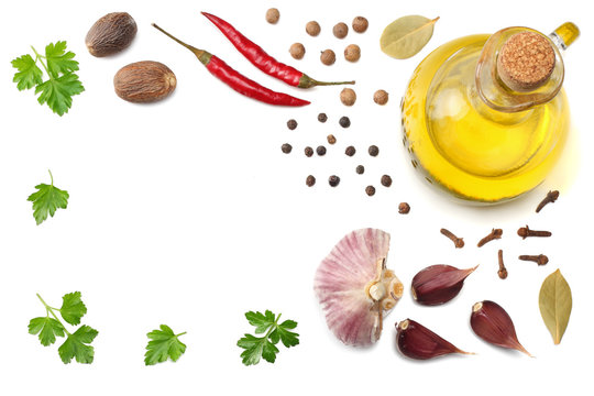 Garlic, Red Chili Or Chilli Cayenne Pepper, Oil, Parsley And Spices Isolated On White Background. Top View