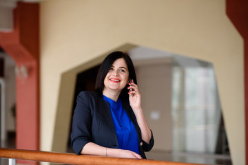 Business woman talking on the phone.