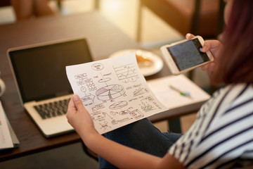 Fototapeta premium Examining general idea drawing