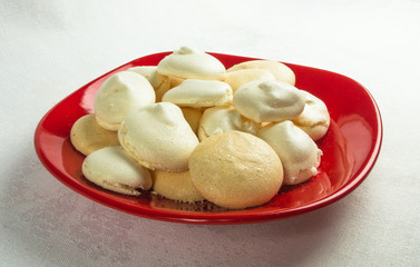 red plate with meringues