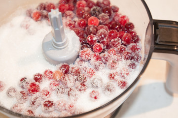 Cranberry in blender with sugar