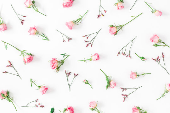 Flowers composition. Pattern made of pink rose flowers on white background. Flat lay, top view