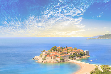 Obraz na płótnie Canvas Beautiful view of the island-resort of St. Stefan (Sveti Stefan) on the Budva Riviera, Budva, Montenegro on a sunny day