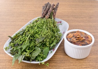 Boil Neem Leaves and Blossom with Sweet Sauce