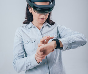 Woman wearing augmented reality goggles.