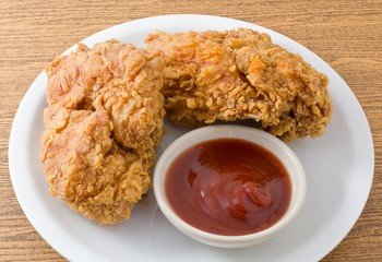 Fried Chicken with Sauce on A White Dish