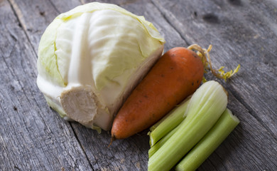 Rezultate imazhesh për Assortment of fresh vegetable celery, carrots, and cabbage