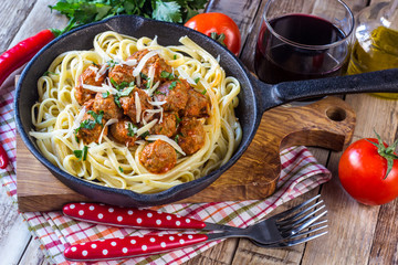 Pasta with tomato sauce and meatballs