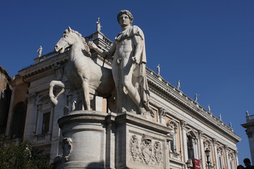 Fototapeta premium Piazza del Campidoglio - Statue of Castor at the Cordonata stairs in Rome, Italy