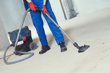 building cleaning service. dust removal with vacuum cleaner