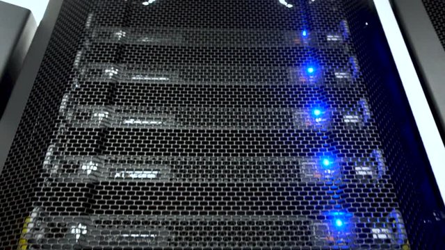 Servers close up. Modern datacenter. Cloud computing. Datacenter with flashing lights. Big Data