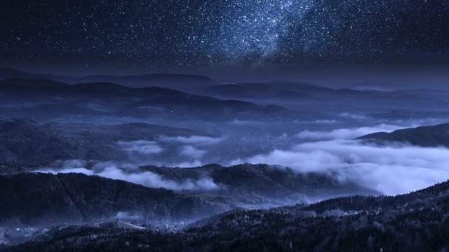 Stunning milky way and flowing clouds in the Tatra Mountains, Poland