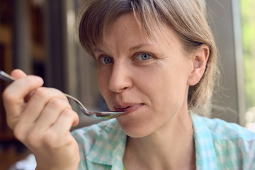 Young woman eating