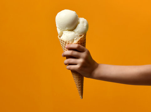 Fresh White Ice Cream Waffles Cone In Kid Hand 