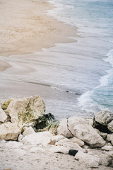 Sea waves splashing at the beach.