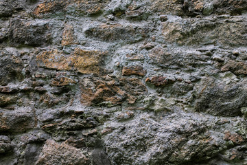 Stone wall of an abandoned castle