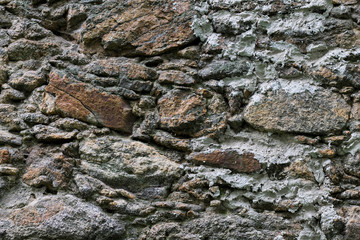 Stone wall of an abandoned castle