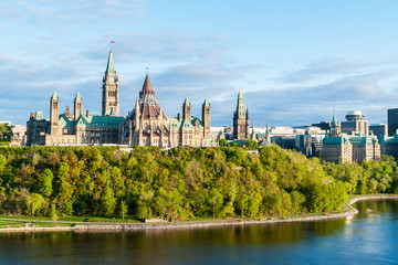 Fototapeta na wymiar Parliament Hill - Ottawa, Ontario, Canada. Its Gothic revival suite of buildings is the home of the Parliament of Canada.