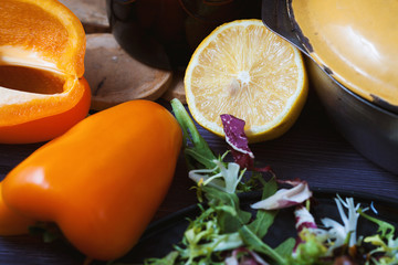 lemon, bell pepper and herbs for meat. Background for postcard