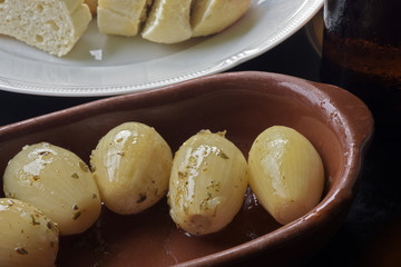 Snack food: cooked onions seasoned with spices