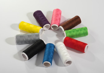 Colorful thread on white isolated background.
