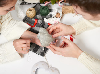 couple making decorations for Valentine's day, recover damaged heart, top view - romantic and love concept
