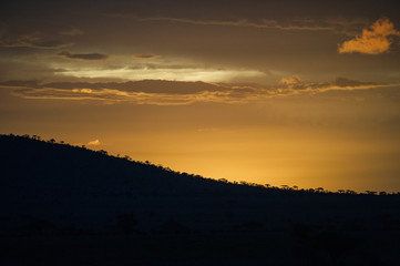 Sundown behind a hill Africa Serengeti