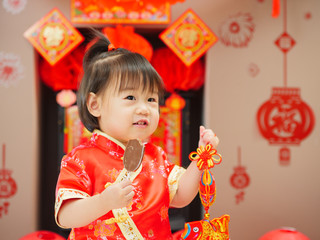 Chinese baby girl  with traditional dressing up and 