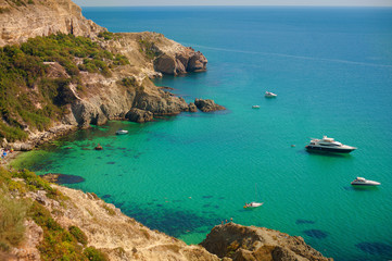 Sailing ship yachts with white sails in a row. Aerial view. Luxury Cruise Sailing by the shore, beach
