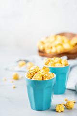 Sweet caramel popcorn for party or cinema at home