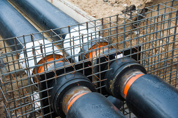 Laying new pipes in the trench