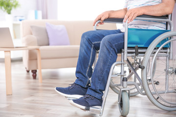Man in wheelchair indoors