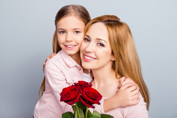 Care trust support parenthood day-off mother's day spring bliss delight pleasure peace people concept. Close up portrait of sweet small kid sitting on nice mommy's hands isolated on gray background