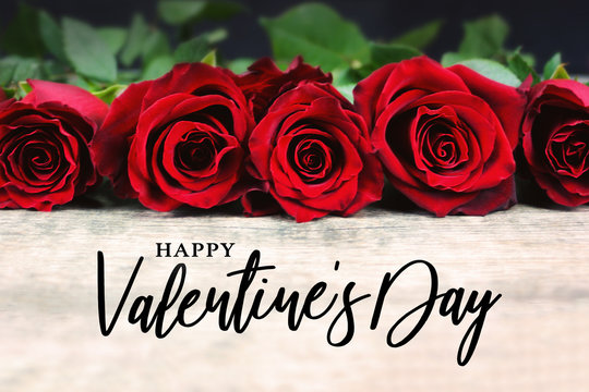 Happy Valentine's Day Typography with Roses in a Line on Rustic Wooden Background - Powered by Adobe