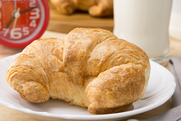 croissant on white dish