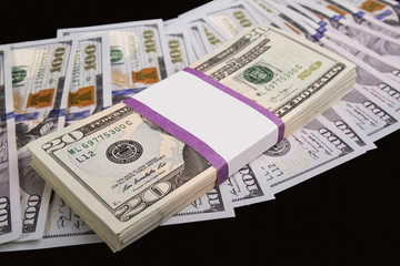 a lot of money on a black background; close-ups