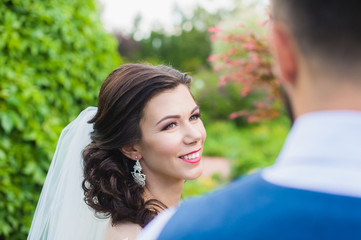 Close-up face of very happy smiling bride