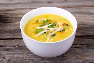 delicious thai curry coconut chiken soup bowl