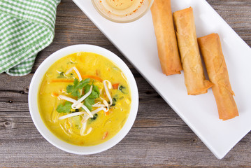 delicious thai curry coconut chiken soup bowl