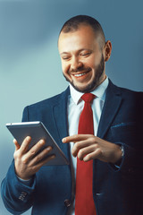 Young contemprary businessman, overlooking pensive - business, serious, technology concept