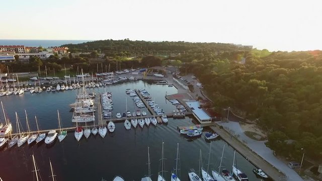 Drone Footage Of Boats Moored, Yachts and Ships in Marine. Sailboats docket in Port at Pula Croatia. 