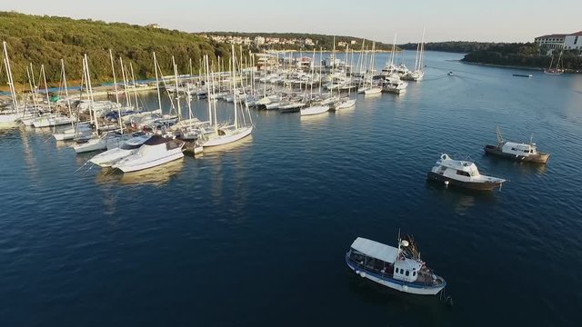 Drone Footage Of Boats Moored, Yachts and Ships in Marine. Sailboats docket in Port at Pula Croatia. 