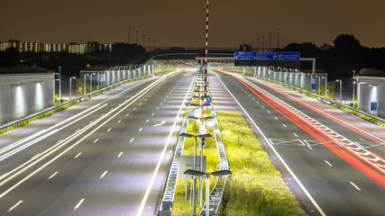 Motorway with tunnel at night