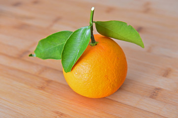 Orange isolated in wooden background