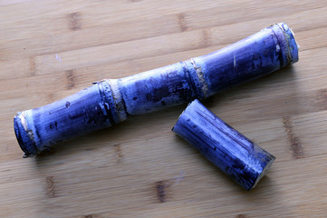 Sugarcane isolated in wooden background