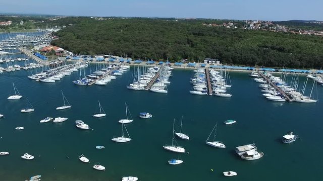 Drone Footage Of Boats Moored, Yachts and Ships in Marine. Sailboats docket in Port at Pula Croatia. 